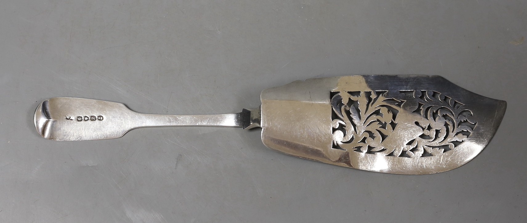 A William IV silver fiddle pattern fish slice, William Eaton, London, 1830, 28.5cm, 114 grams.
